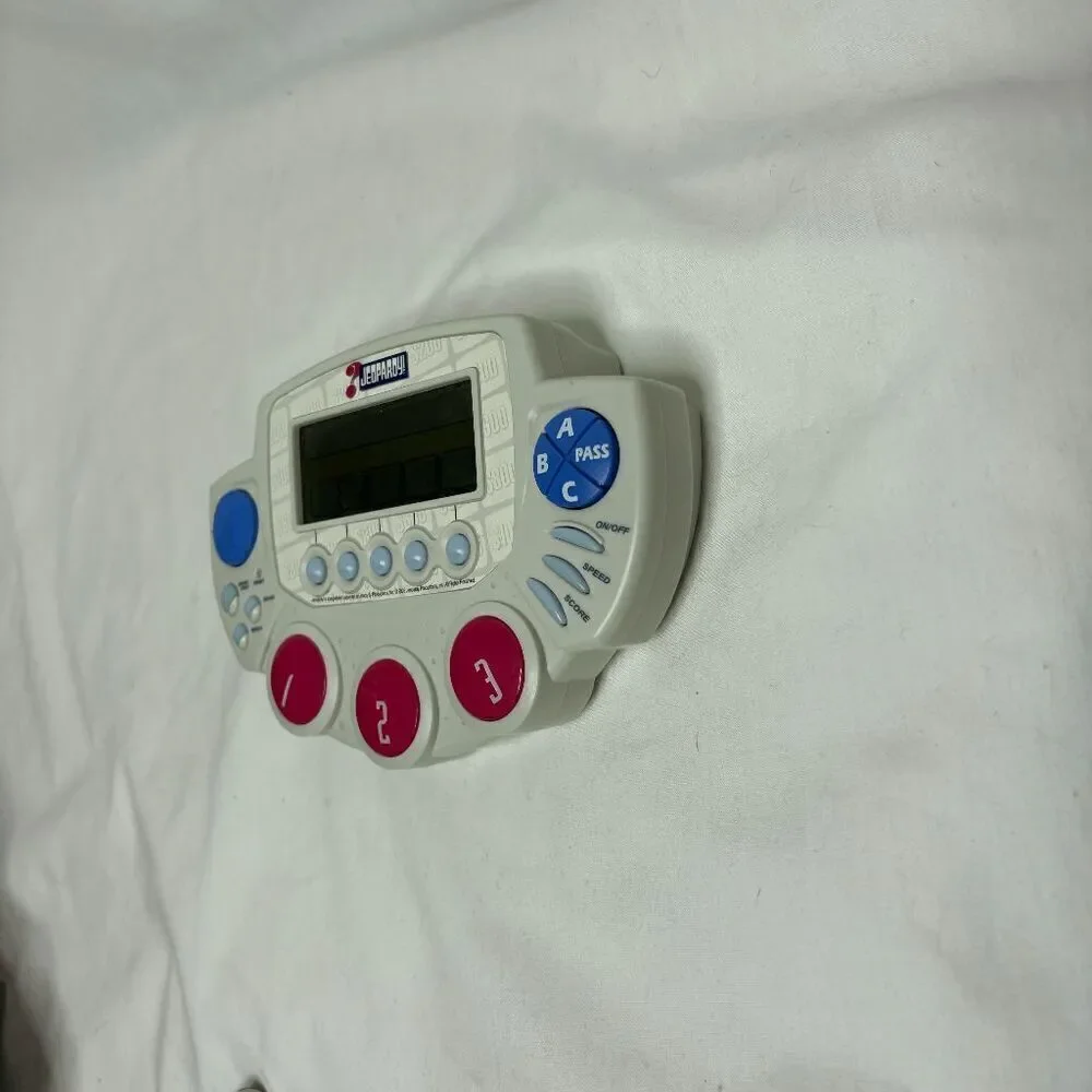 Tiger‎ Electronics 2005 Jeopardy Handheld Game 1200 Questions Travel Game